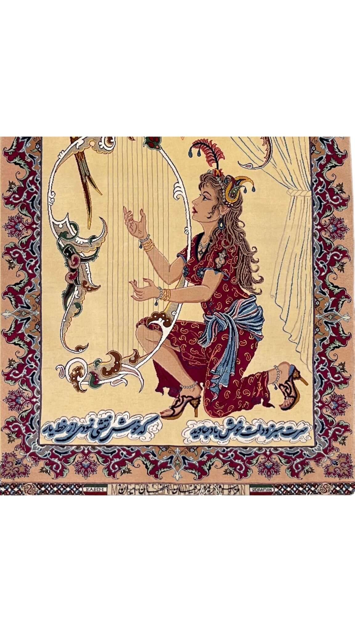 Luxurious Seirafian carpet from Isfahan, Iran, with detailed craftsmanship portraying a harp player and parrots, bordered with rich ornamental patterns.